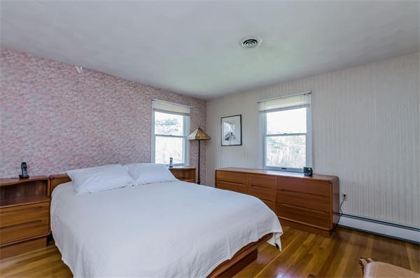126 North Branch Road Concord, MA 01742 - Photo 16 of 22 a bedroom with a bed and window