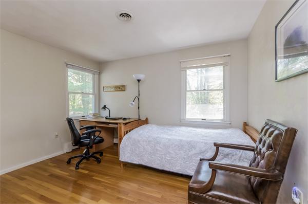 126 North Branch Road Concord, MA 01742 - Photo 17 of 22 a bedroom with a bed and a desk