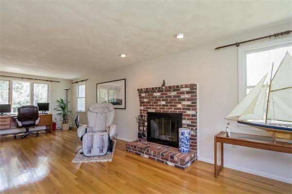 126 North Branch Road Concord, MA 01742 - Photo 20 of 22 a living room with furniture large window and a fireplace