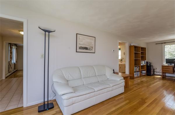 126 North Branch Road Concord, MA 01742 - Photo 3 of 22 a living room with furniture and a table