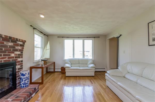126 North Branch Road Concord, MA 01742 - Photo 4 of 22 a living room with furniture and a fireplace