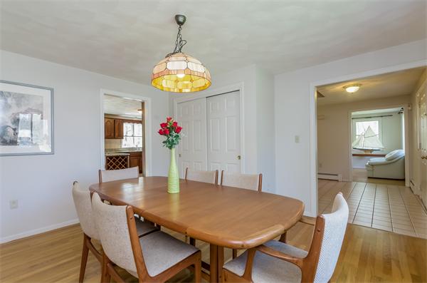 126 North Branch Road Concord, MA 01742 - Photo 6 of 22 a view of a dining room with furniture and wooden floor