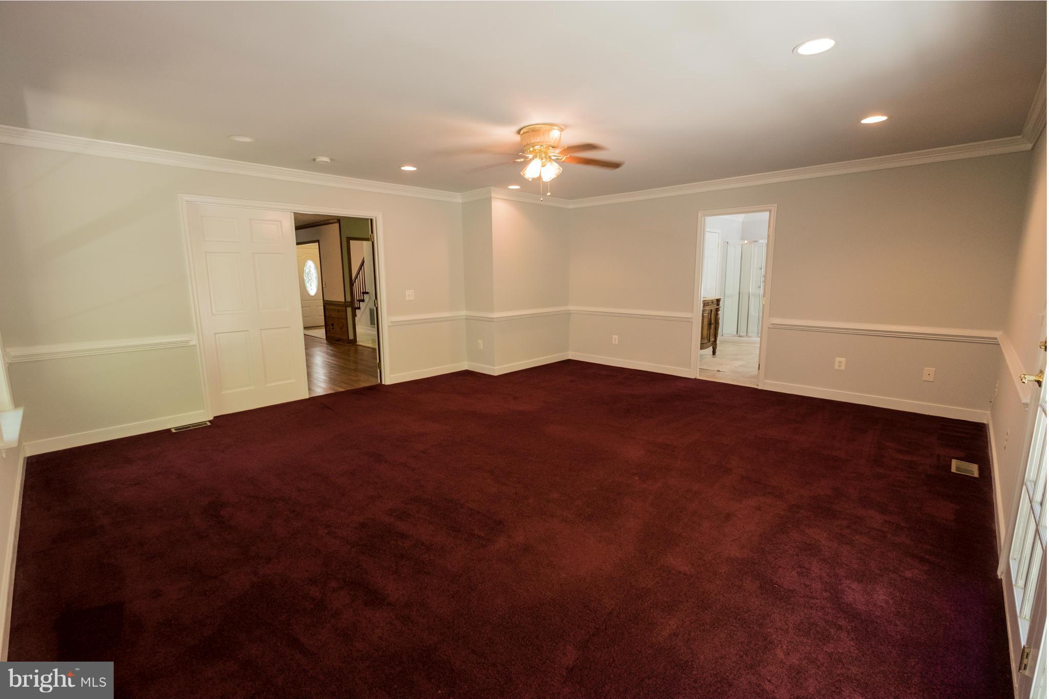 2034 Coast Guard Drive Stafford, VA 22554 - Photo 15 of 30 a view of livingroom with hardwood floor and a ceiling fan