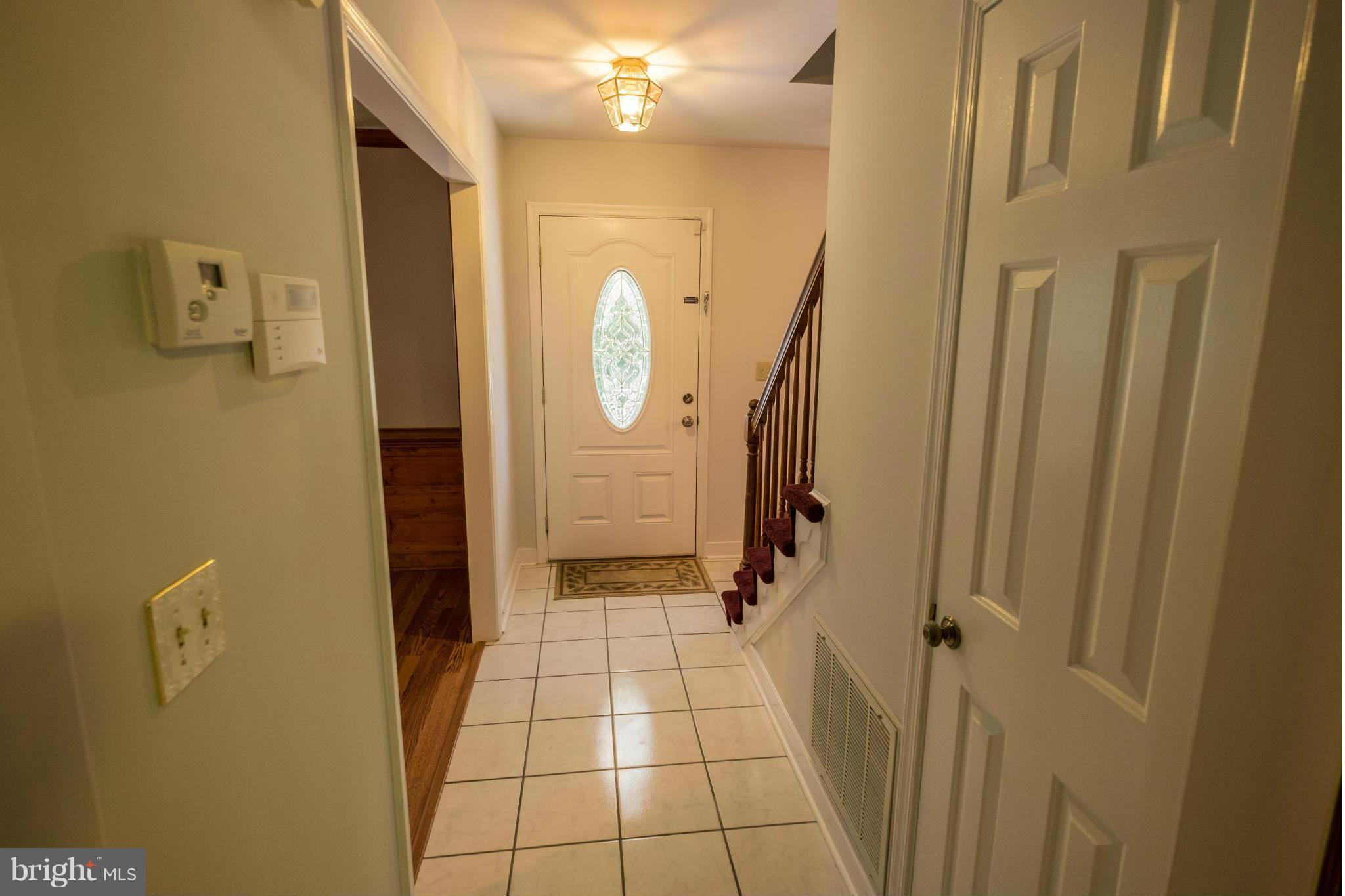 2034 Coast Guard Drive Stafford, VA 22554 - Photo 3 of 30 a bathroom with a glass door shower