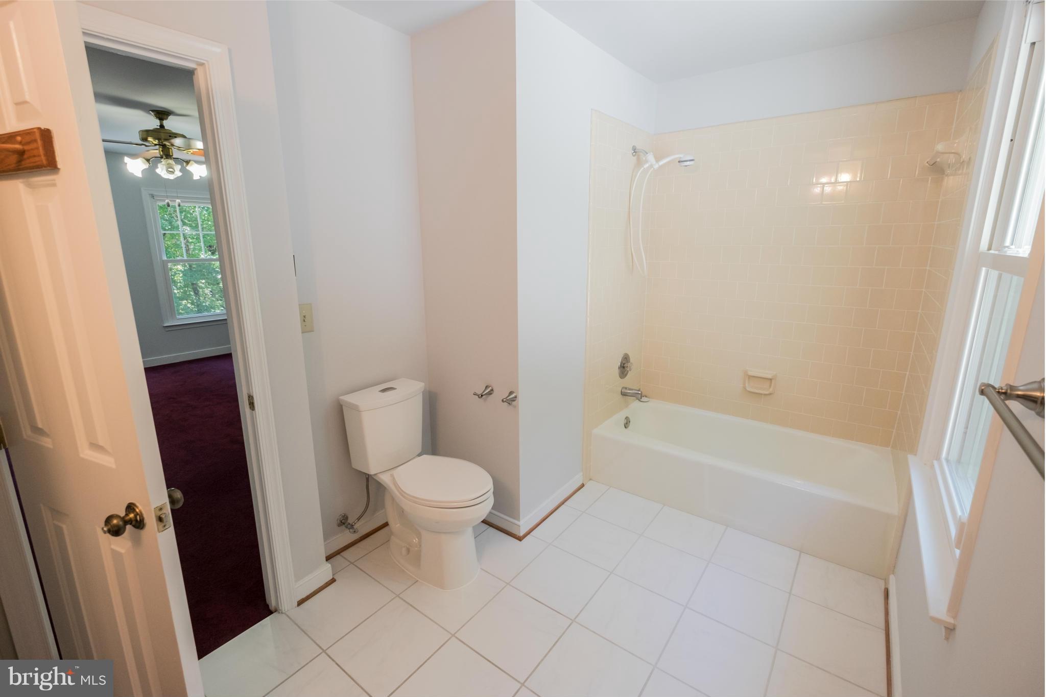 2034 Coast Guard Drive Stafford, VA 22554 - Photo 22 of 30 a bathroom with a toilet and a bathtub