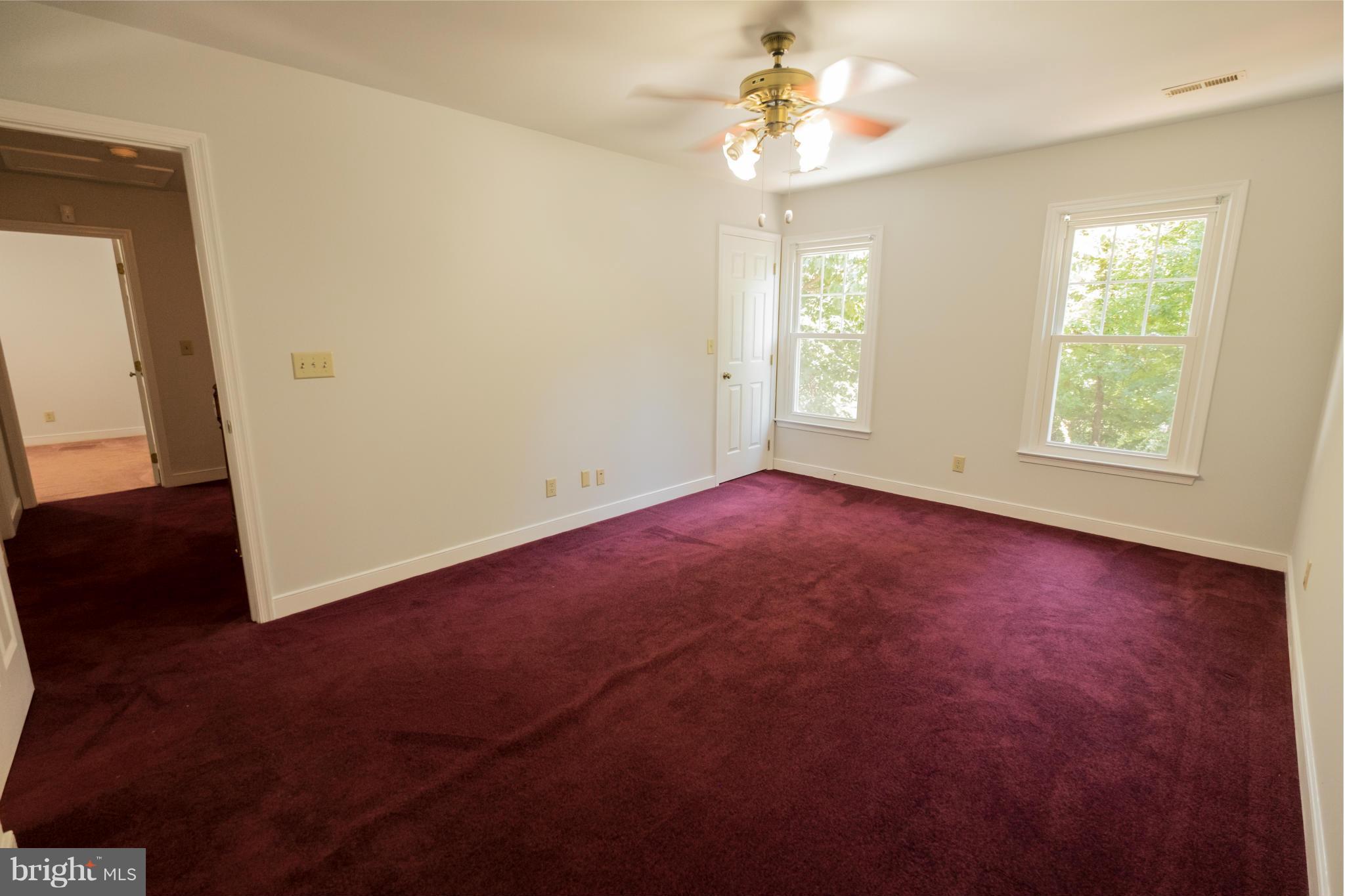 2034 Coast Guard Drive Stafford, VA 22554 - Photo 23 of 30 an empty room with windows and fan