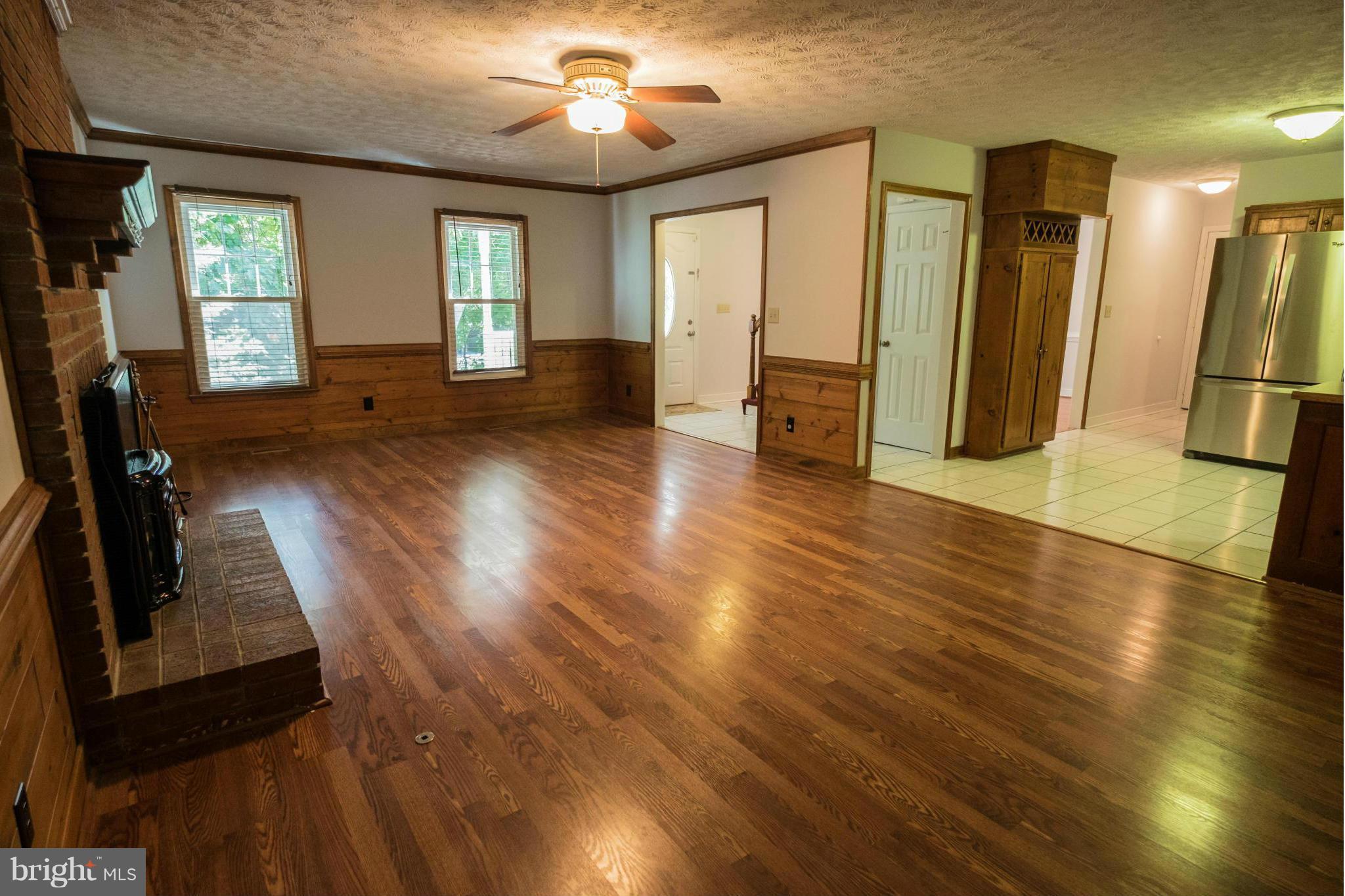 2034 Coast Guard Drive Stafford, VA 22554 - Photo 8 of 30 a view of a room with wooden floor and windows