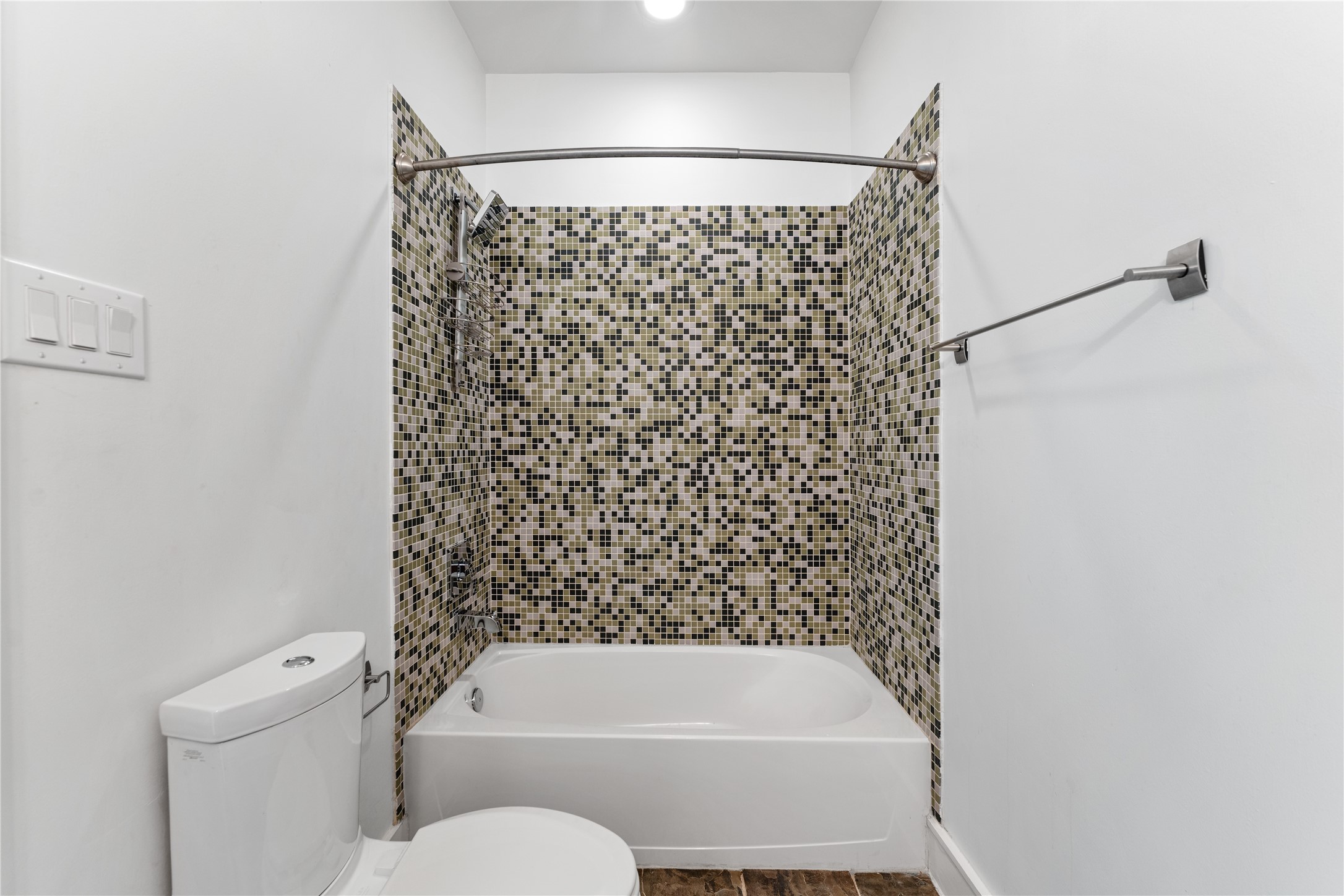 6112 Tyne Street, Unit B Houston, TX 77007 - Photo 15 of 33 a bathroom with a toilet and a shower