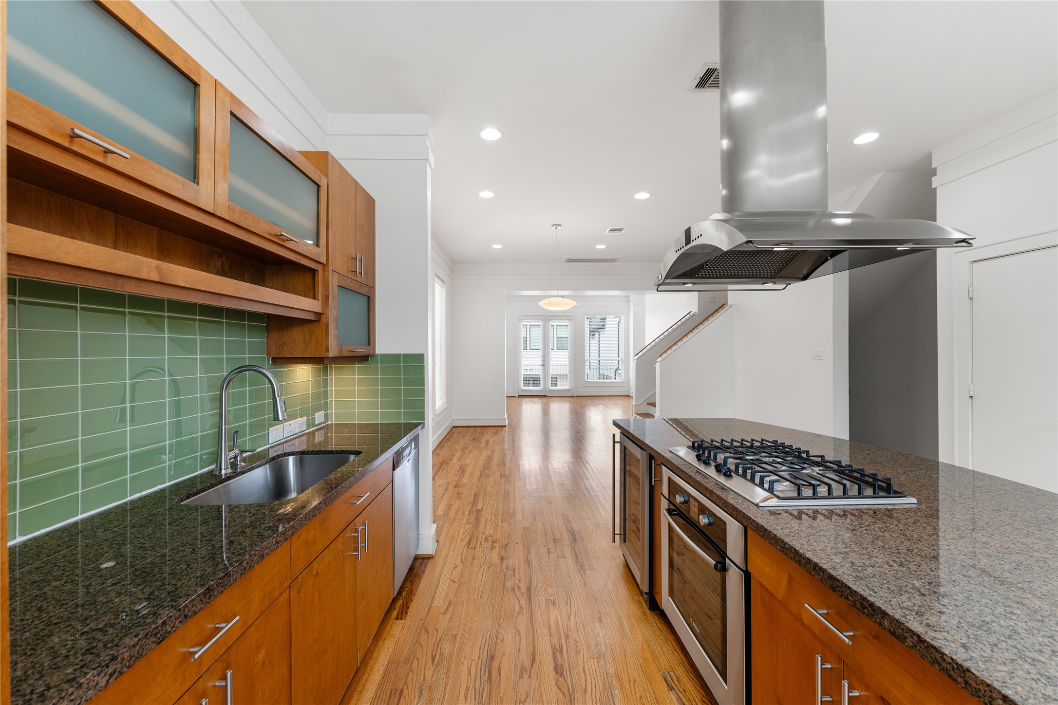 6112 Tyne Street, Unit B Houston, TX 77007 - Photo 19 of 33 a kitchen with counter top space and stainless steel appliances