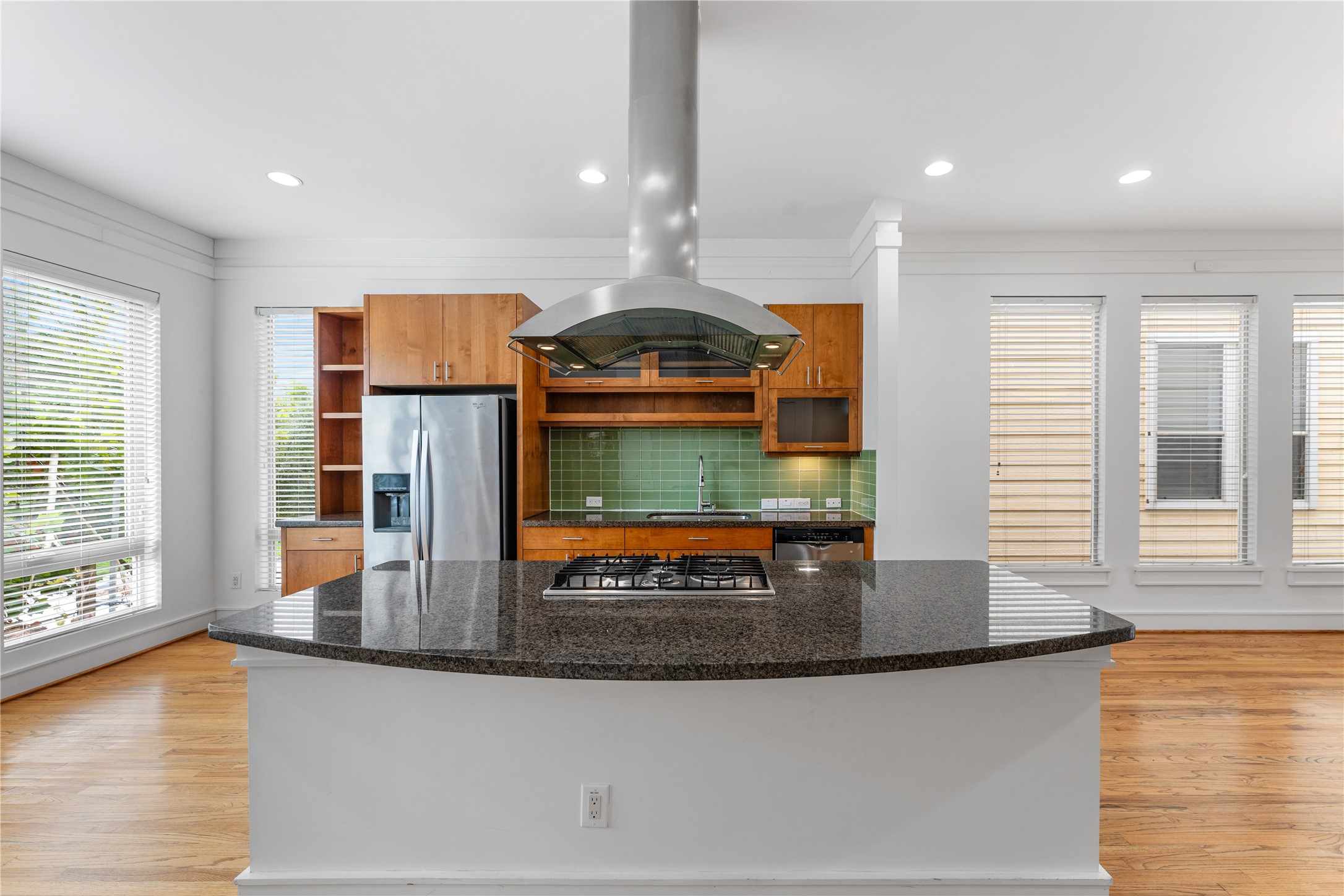 6112 Tyne Street, Unit B Houston, TX 77007 - Photo 2 of 33 a kitchen with stainless steel appliances granite countertop a stove a sink and a microwave