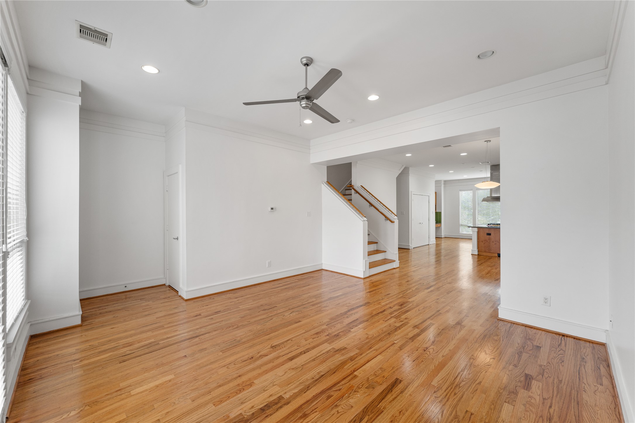 6112 Tyne Street, Unit B Houston, TX 77007 - Photo 22 of 33 a view of a hallway with wooden floor