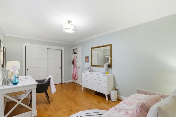 a view of washer and dryer with wooden floor