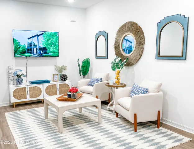 a living room with furniture and a window