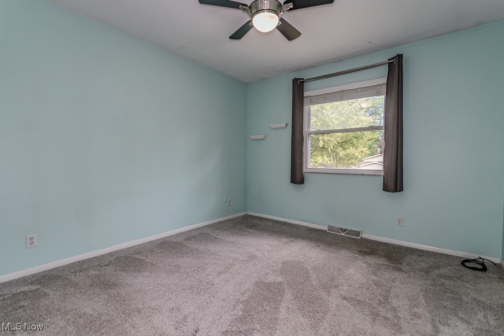 2969 Gale Road Willoughby, OH 44094 - Photo 16 of 46 Empty room featuring carpet flooring and a ceiling fan