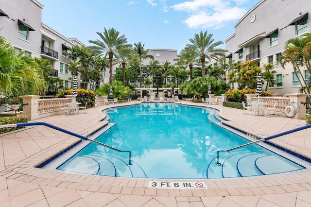 a view of a swimming pool with a patio