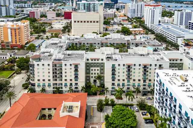 an aerial view of residential building and parking space