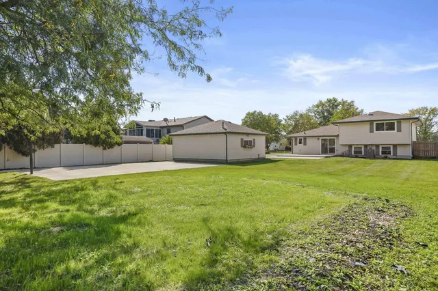 a house view with a garden space