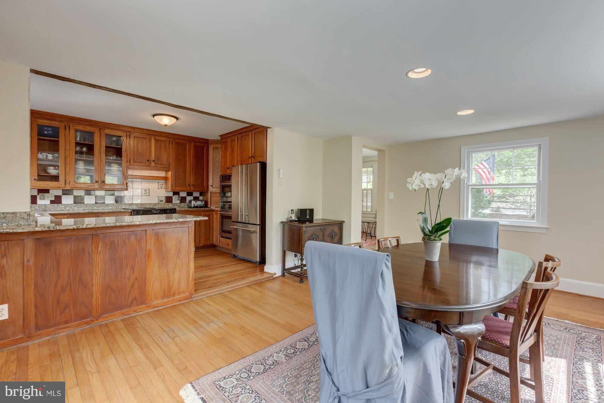 10425 Glen Road Potomac, MD 20854 - Photo 22 of 30 Gourmet Kitchen Opens to Dining Room