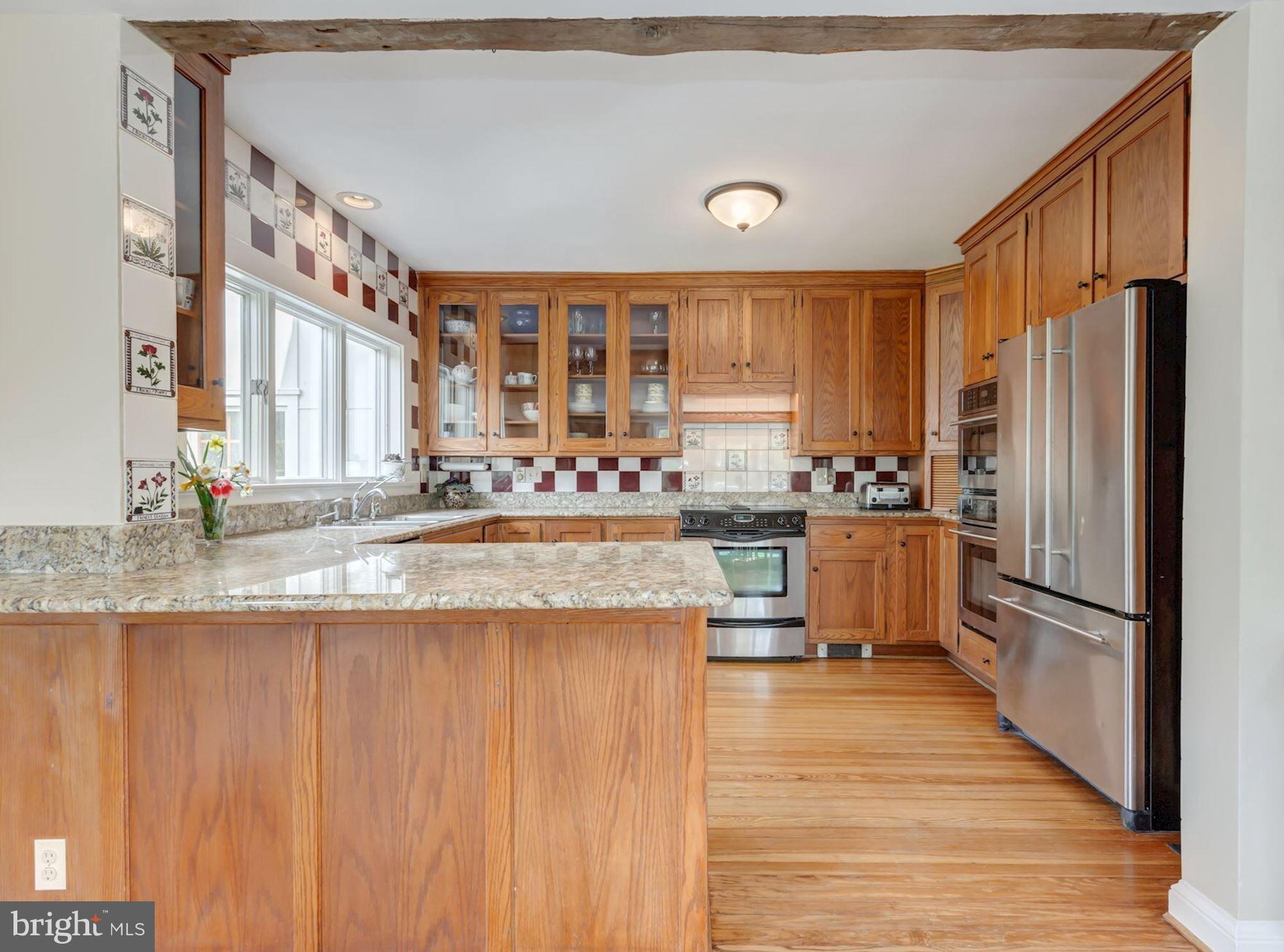 10425 Glen Road Potomac, MD 20854 - Photo 23 of 30 Granite Countertops and Stainless Steel Appliances