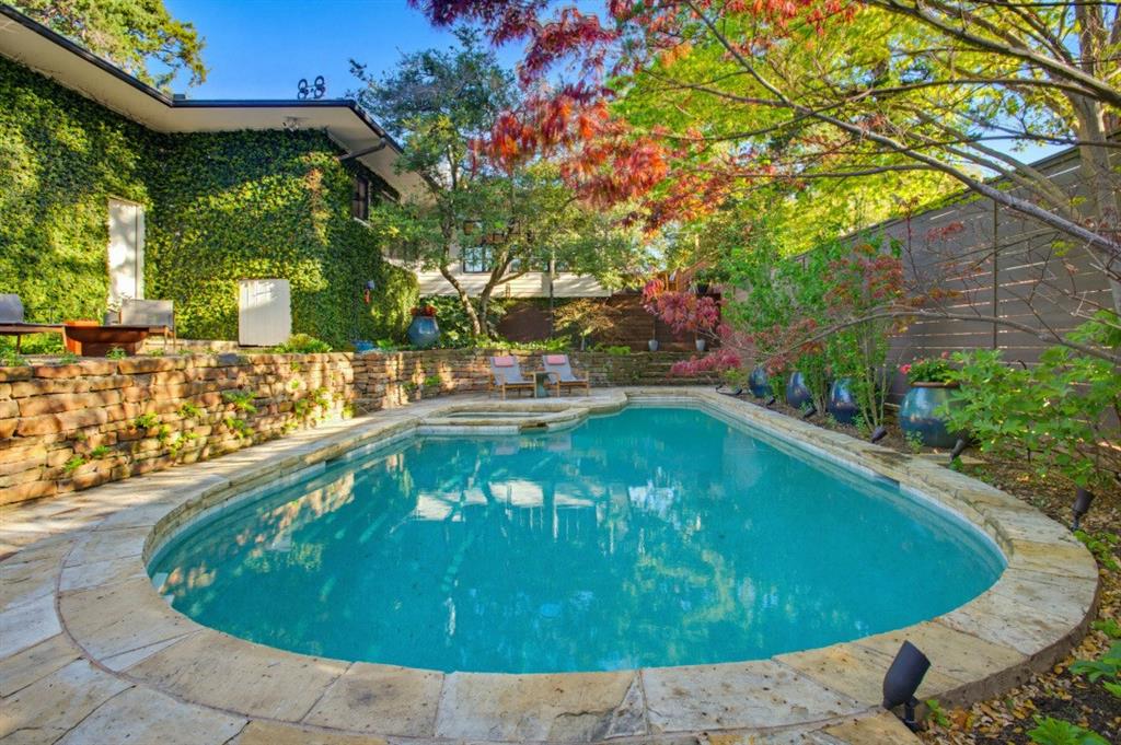 1014 Evergreen Hills Road Dallas, TX 75208 - Photo 11 of 12 a view of a swimming pool with a yard