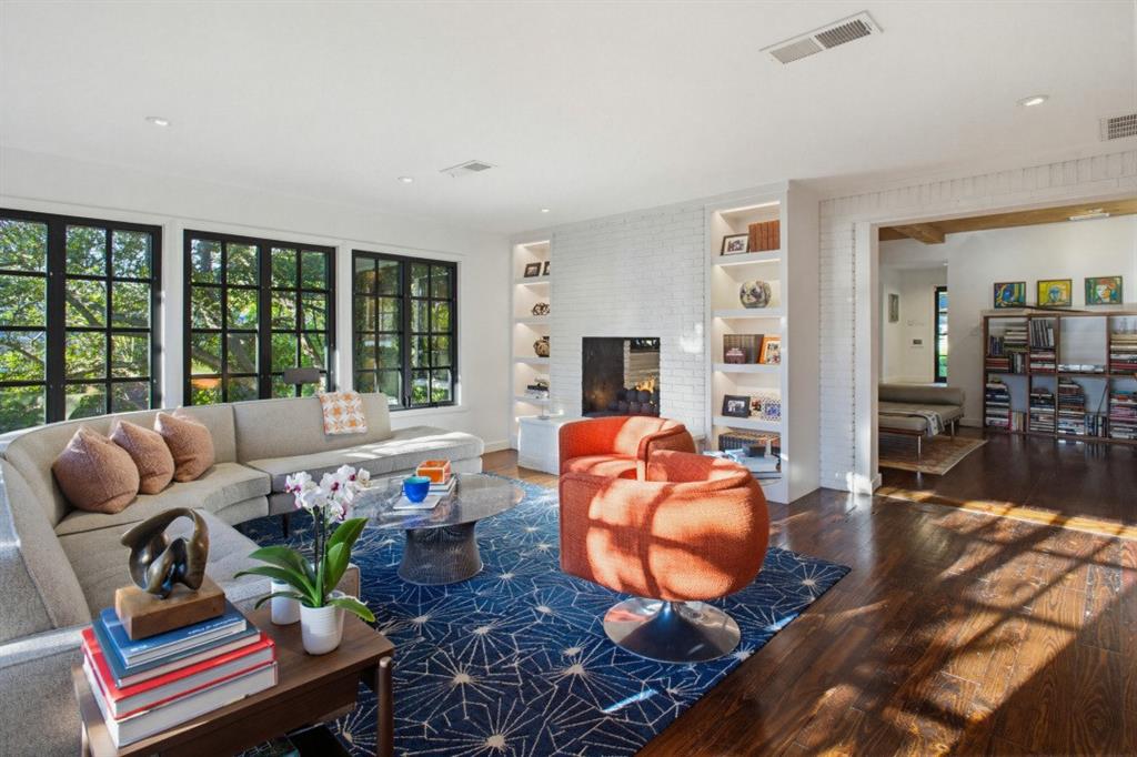1014 Evergreen Hills Road Dallas, TX 75208 - Photo 2 of 12 a living room with furniture fireplace and a large window