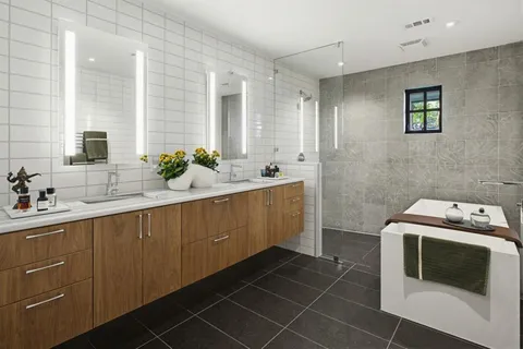 a kitchen with a sink cabinets and window