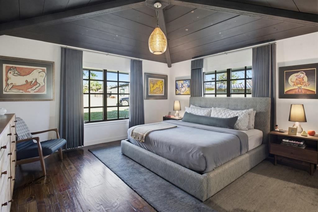 1014 Evergreen Hills Road Dallas, TX 75208 - Photo 8 of 12 a spacious bedroom with a bed and a window