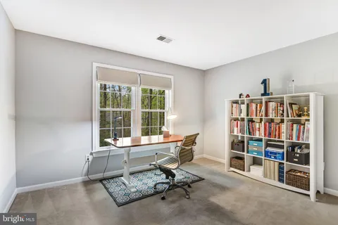 a view of a livingroom with furniture