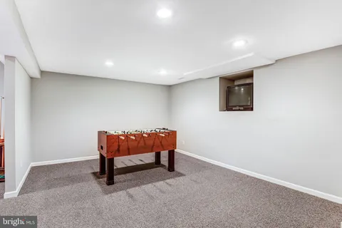 a view of a chairs and table in the balcony