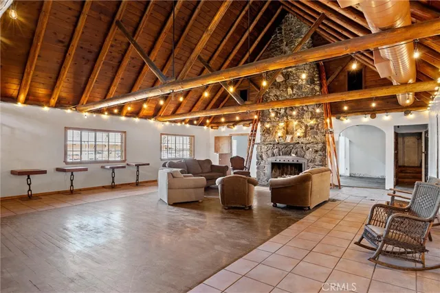 a room with furniture and a fireplace