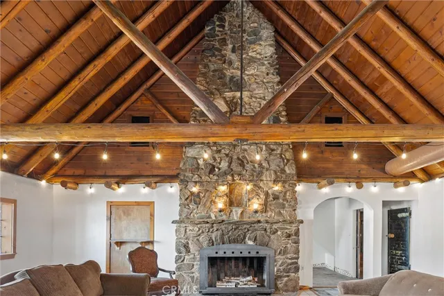 a view of washer and dryer with a fireplace in front of it