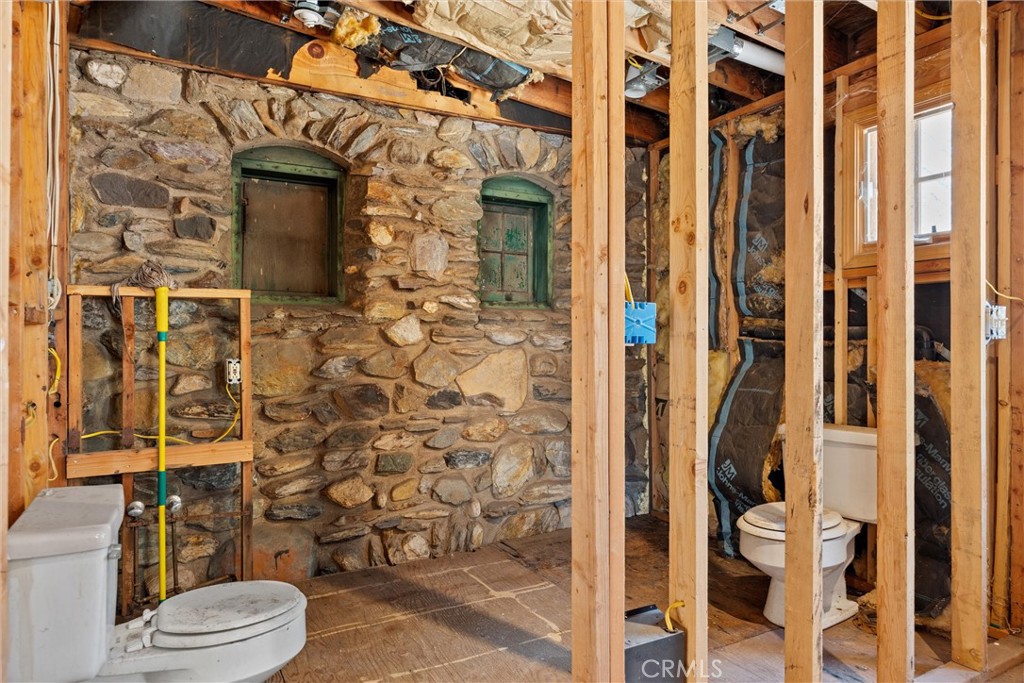 1918 East Main Street Quincy, CA 95971 - Photo 23 of 28 a bathroom with a toilet and shower