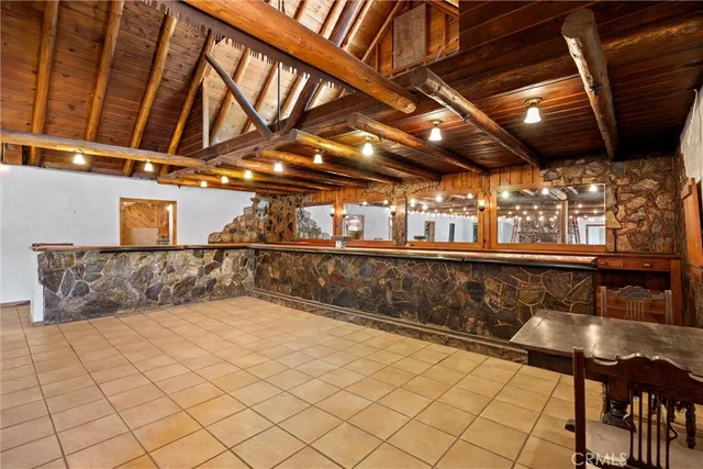 a view of a kitchen with furniture and a kitchen