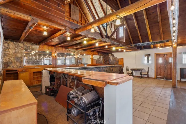 a view of a patio with a table and chairs