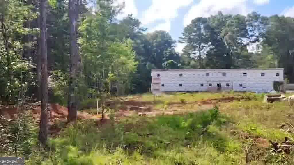 125 Little Road Northwest Milledgeville, GA 31061 - Photo 5 of 5 a view of a yard with swimming pool