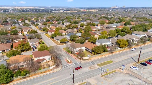 an aerial view of a city with lots of residential buildings