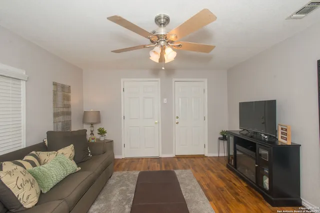 a living room with furniture and a couch
