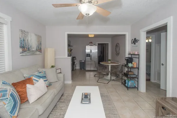 a kitchen with a sink cabinets and appliances
