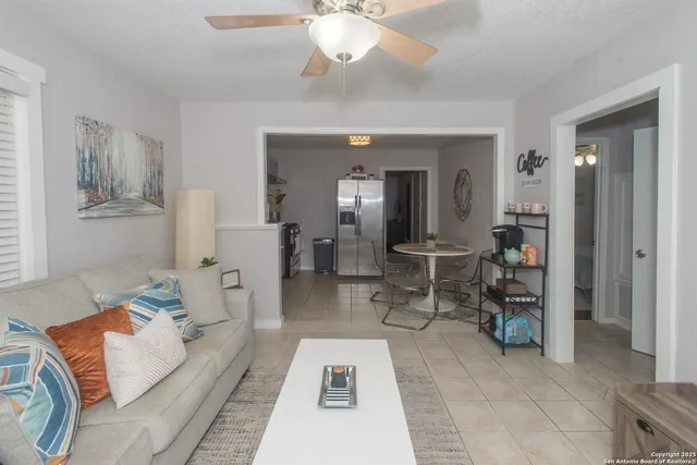 a kitchen with a sink cabinets and appliances