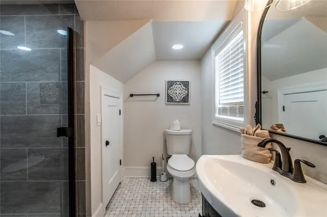 a bathroom with a sink and a toilet