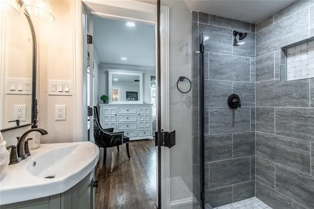 a bathroom with a sink and mirror
