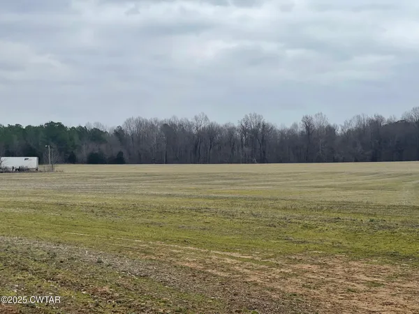 a view of an ocean and mountain