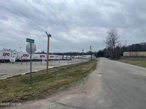 a view of lake with green space