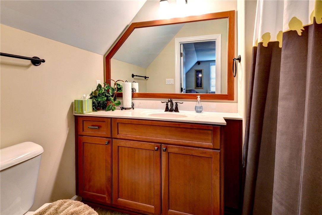 11 Butler Farm Road Hampton, VA 23666 - Photo 34 of 39 Bathroom featuring vaulted ceiling and vanity