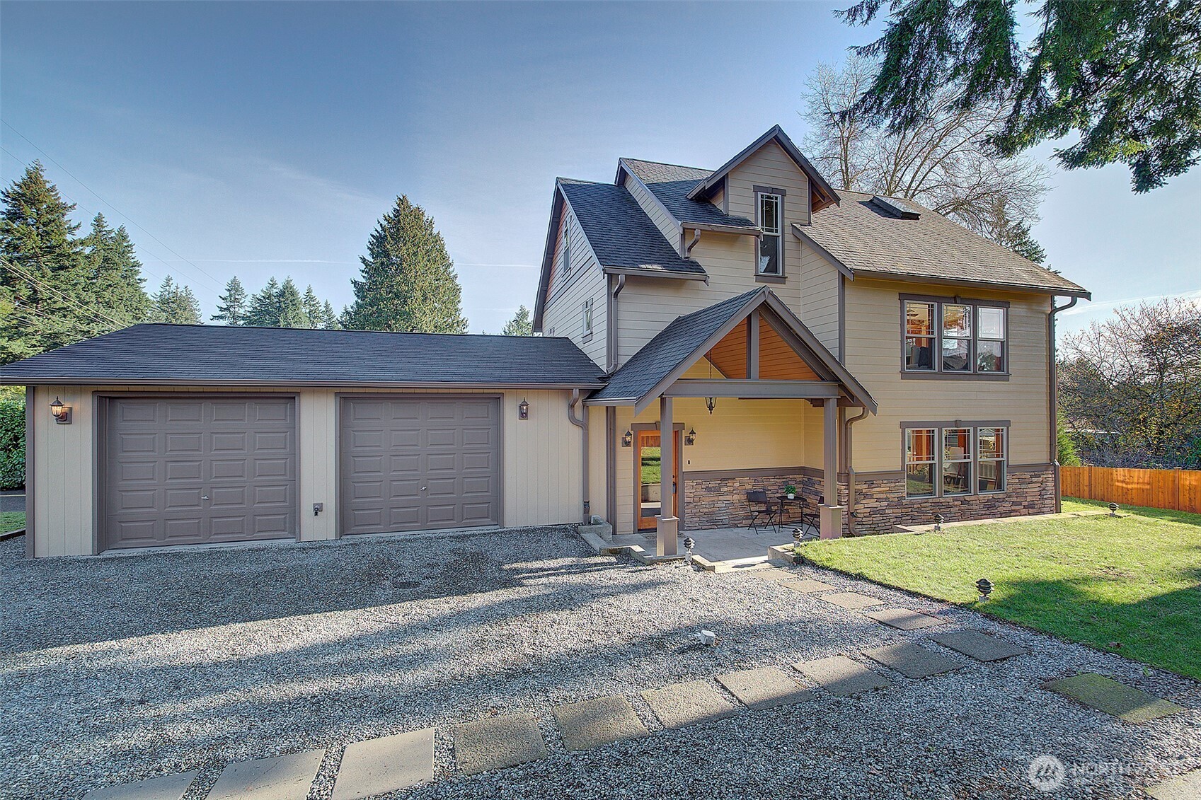 311 Northeast 117th Street Seattle, WA 98125 - Photo 1 of 40 a view of a house with a yard and large tree