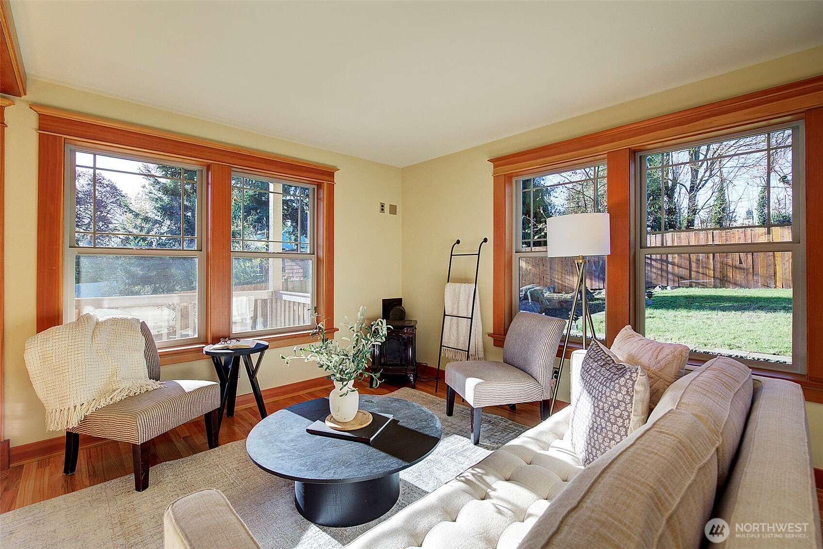 311 Northeast 117th Street Seattle, WA 98125 - Photo 13 of 40 a living room with furniture and a large window