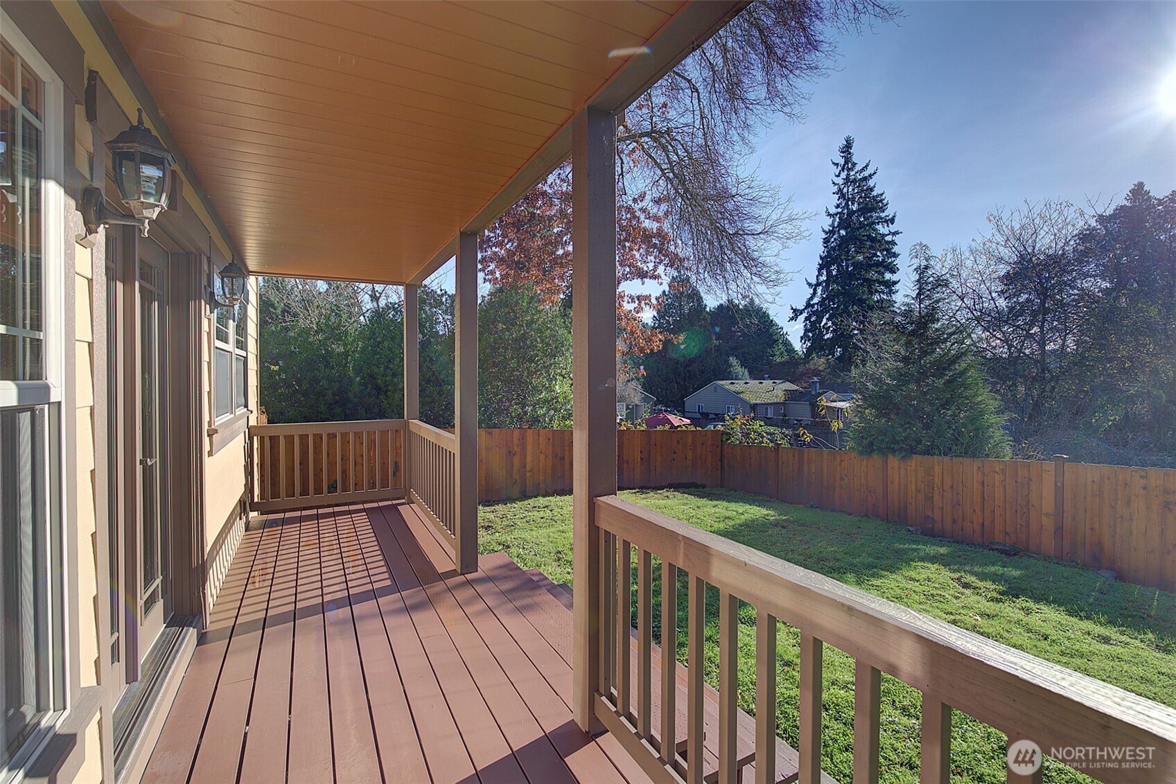 311 Northeast 117th Street Seattle, WA 98125 - Photo 15 of 40 a view of balcony with wooden floor