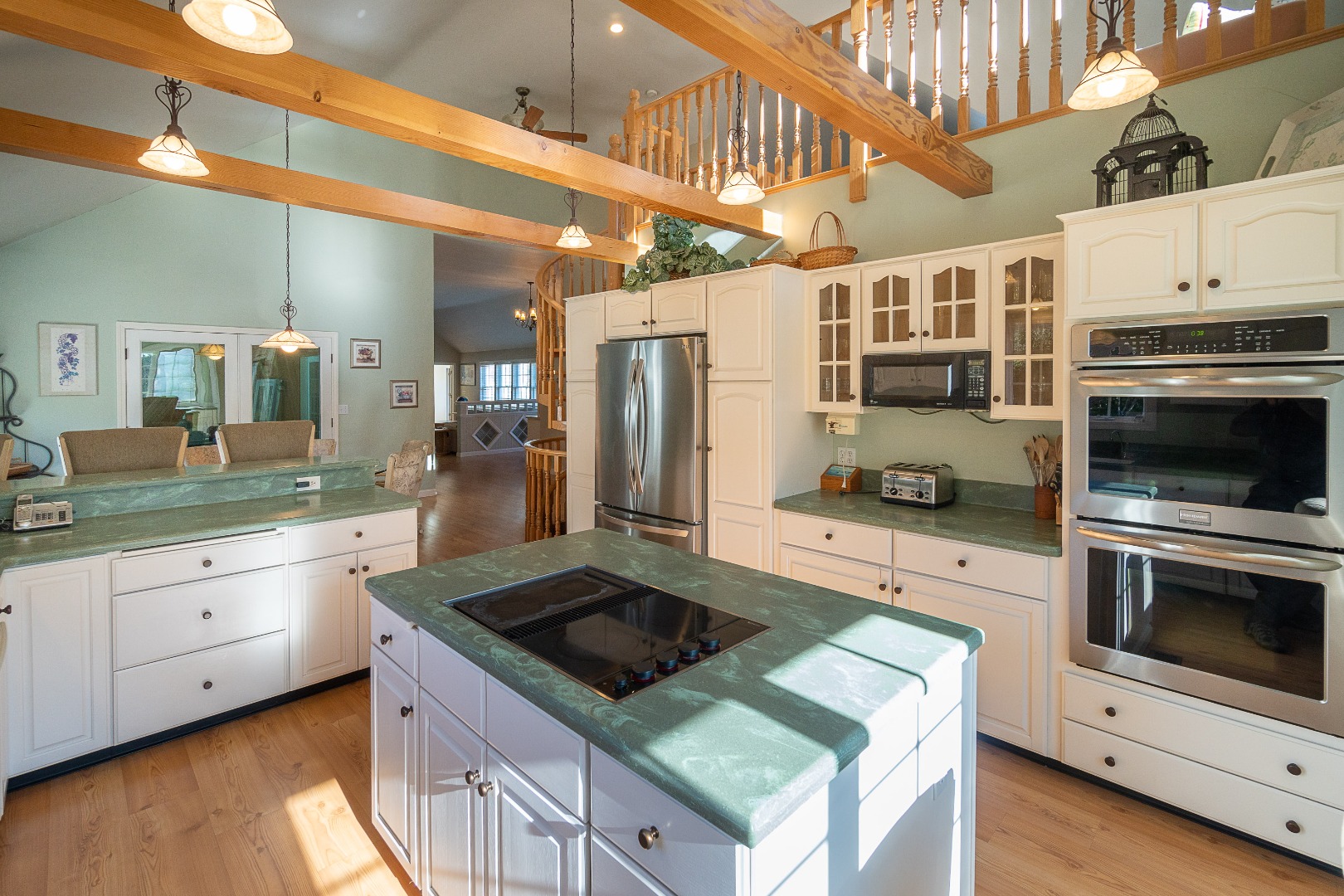 35 Pine Crest Drive Nantucket, MA 02554 - Photo 11 of 44 a kitchen with stainless steel appliances kitchen island granite countertop a stove a sink and a refrigerator