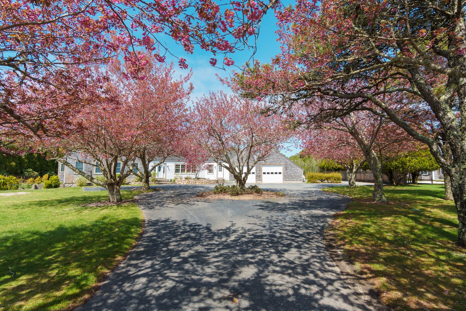 35 Pine Crest Drive Nantucket, MA 02554 - Photo 2 of 44 a view of a yard with plants and trees