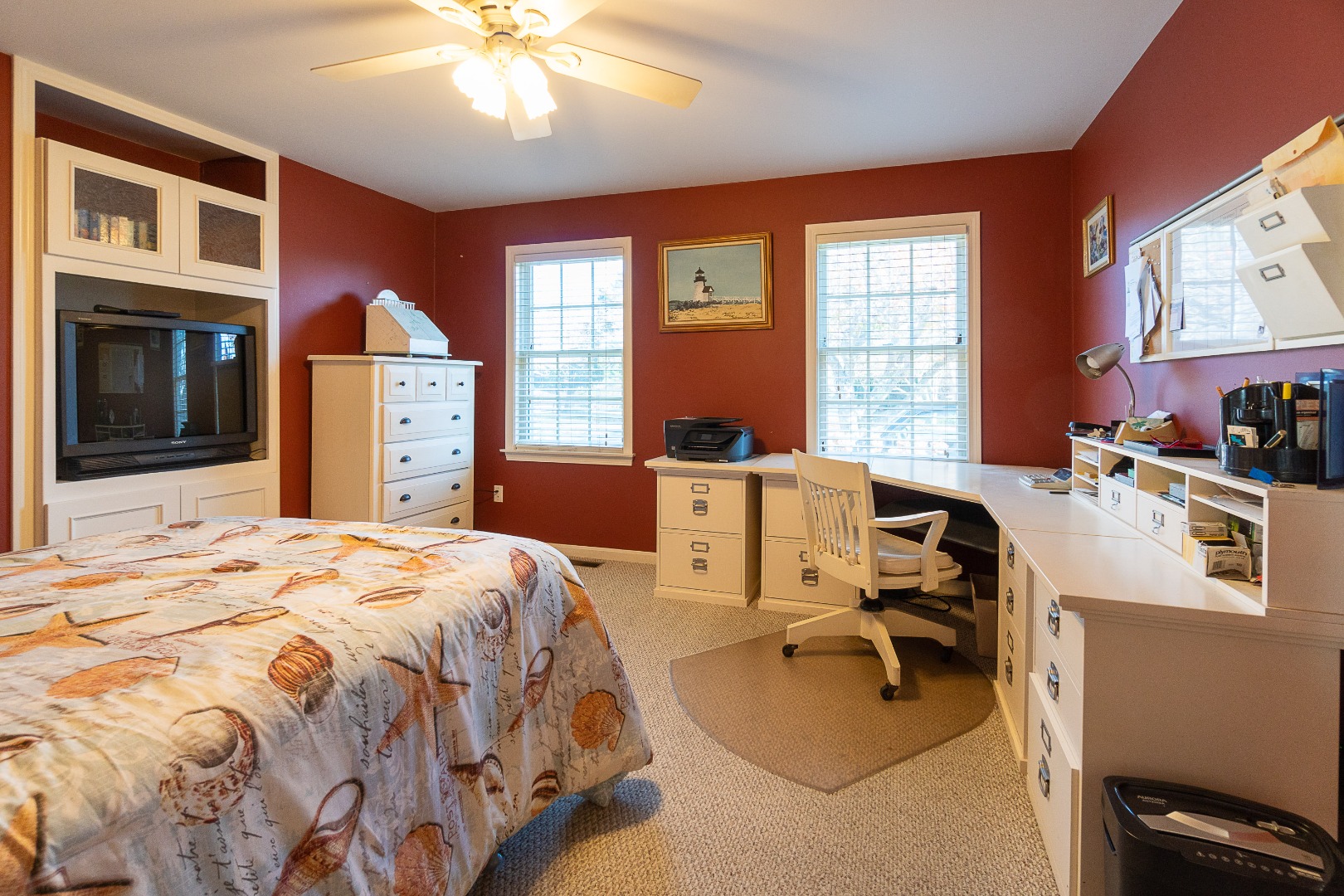35 Pine Crest Drive Nantucket, MA 02554 - Photo 25 of 44 a bed room with a bed and a chandelier